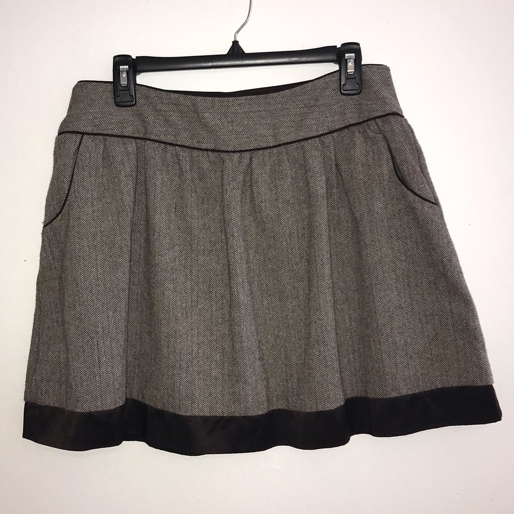 Tweed like skirt with pockets